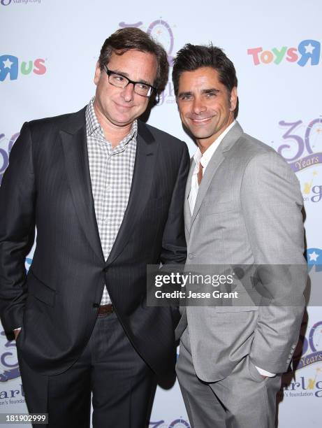 Actors Bob Saget and John Stamos attend The Starlight Children's Foundation's 30th Anniversary Gala at the Skirball Cultural Center on September 25,...