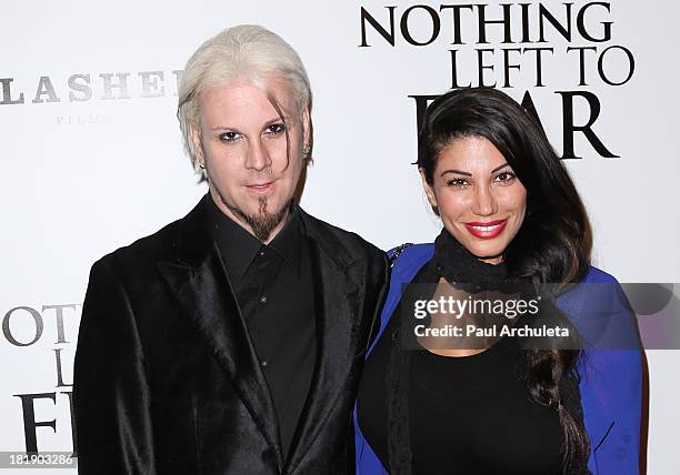 Recording Artist John 5 and Rita Lowery attend the "Nothing Left To Fear" Los Angeles premiere at ArcLight Cinemas on September 25, 2013 in...