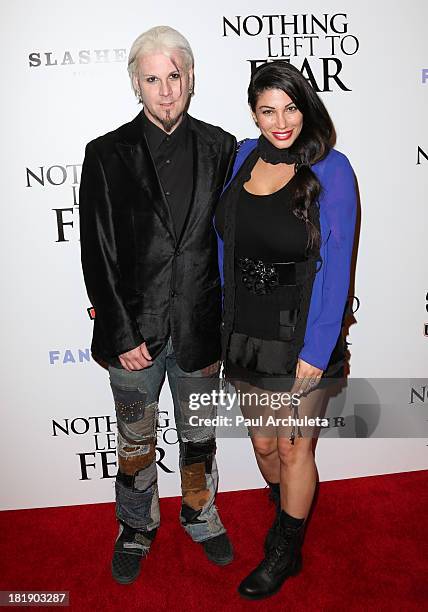 Recording Artist John 5 and Rita Lowery attend the "Nothing Left To Fear" Los Angeles premiere at ArcLight Cinemas on September 25, 2013 in...
