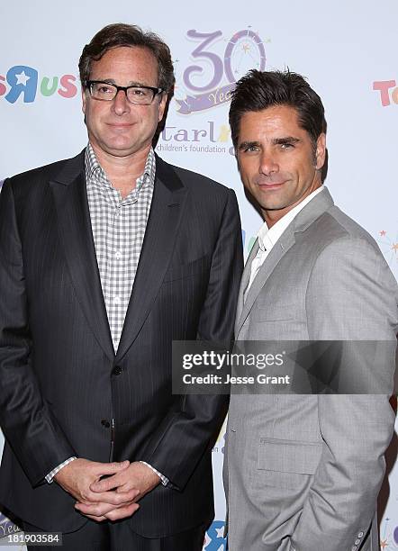 Actors Bob Saget and John Stamos attend The Starlight Children's Foundation's 30th Anniversary Gala at the Skirball Cultural Center on September 25,...