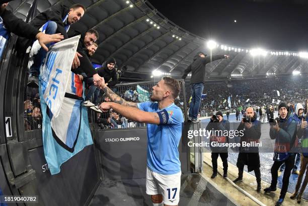 Ciro Immobile of SS Lazio celebrates the victory with fans of Curva Nord after the UEFA Champions League match between SS Lazio and Celtic FC at...