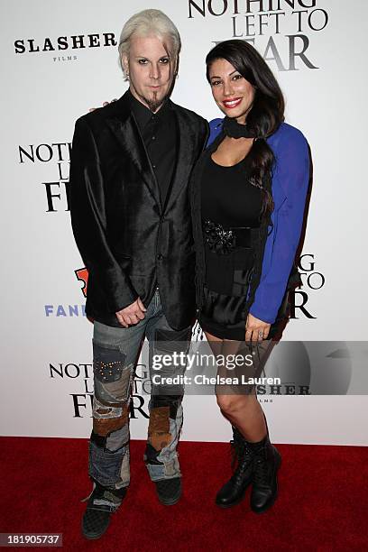 Musician John 5 and wife Rita Lowery arrive at the Los Angeles premiere of "Nothing Left to Fear" at ArcLight Hollywood on September 25, 2013 in...
