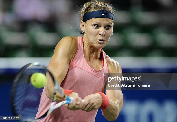 Lucie Safarova of Czech Republic in action during her women's singles quarter final match against Caroline Wozniacki of Denmark during day five of...