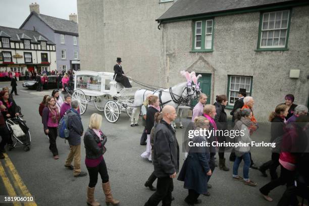 The funeral cortege of murdered schoolgirl April Jones arrives at St Peter's Church for her funeral service on September 26, 2013 in Machynlleth,...