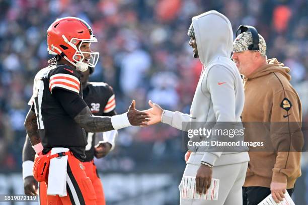 Dorian Thompson-Robinson of the Cleveland Browns talks with Deshaun Watson during the first half against the Pittsburgh Steelers at Cleveland Browns...