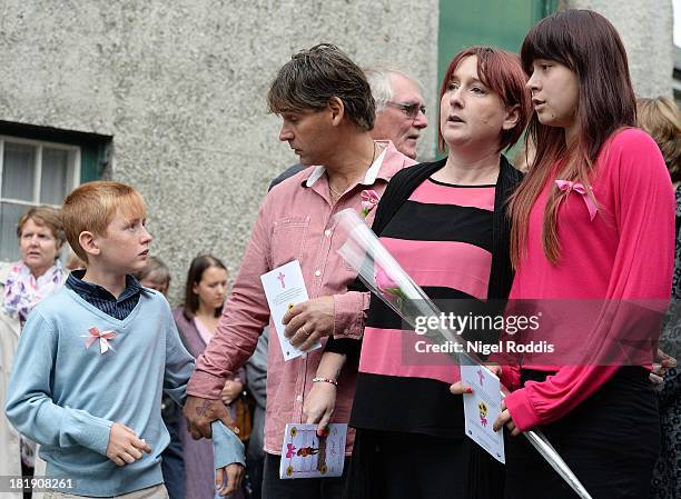 Parents Paul Jones and Coral Jones and family members leave after the funeral of their daughter April Jones at St Peter's Church on September 26,...