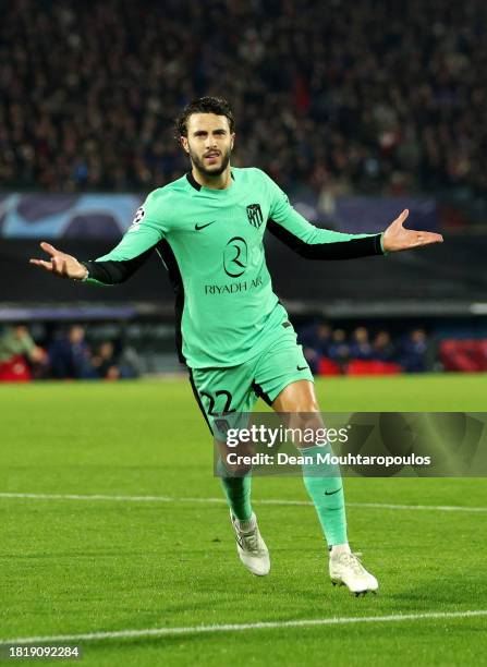 Mario Hermoso of Atletico Madrid celebrates after scoring the team's second goal during the UEFA Champions League Group E match between Feyenoord...