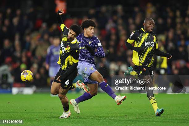 Gabriel Sara of Norwich City has a shot blocked by Jamal Lewis of Watford during the Sky Bet Championship match between Watford and Norwich City at...