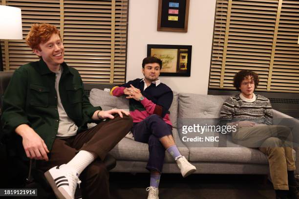 Emma Stone, Noah Kahan" Episode 1850 -- Pictured: Ben Marshall, John Higgins, and Martin Herlihy during the "PDD: AI" sketch on Saturday, December 2,...