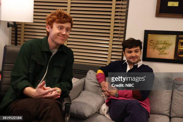 Emma Stone, Noah Kahan" Episode 1850 -- Pictured: Ben Marshall and John Higgins during the "PDD: AI" sketch on Saturday, December 2, 2023 --