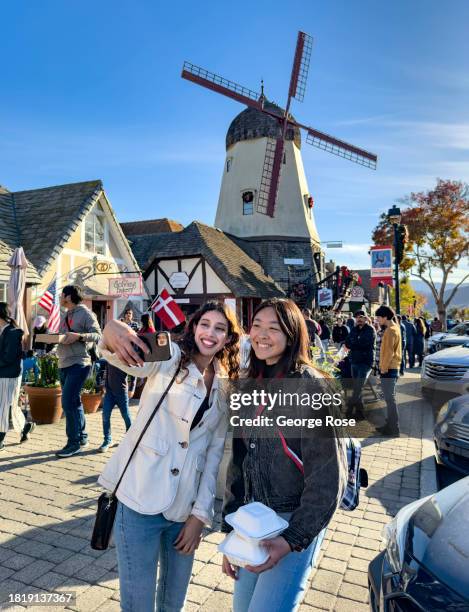 Tourists flock to this Danish tourist town during the long Thanksgiving Weekend to eat aebleskivers, ice cream, and baked goods as viewed on November...