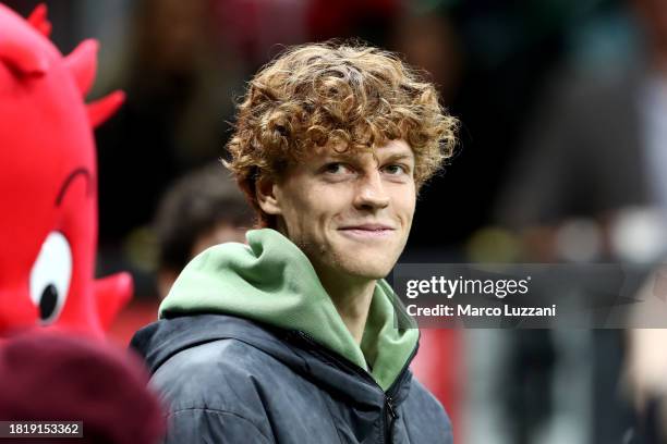 Italian Professional Tennis player, Jannik Sinner, looks on prior to the UEFA Champions League match between AC Milan and Borussia Dortmund at Stadio...