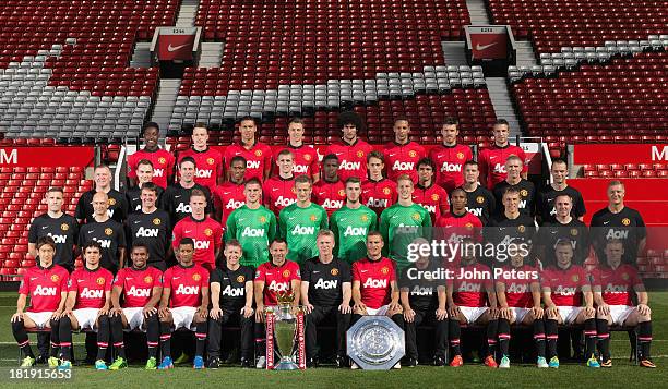 The Manchester United squad Danny Welbeck, Phil Jones, Chris Smalling, Jonny Evans, Marouane Fellaini, Rio Ferdinand, Michael Carrick, Robin van...