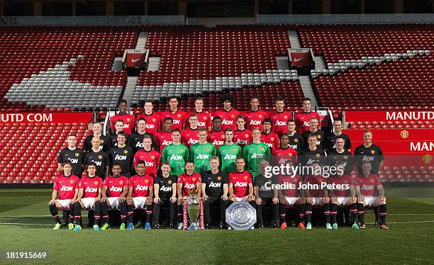 The Manchester United squad Danny Welbeck, Phil Jones, Chris Smalling, Jonny Evans, Marouane Fellaini, Rio Ferdinand, Michael Carrick, Robin van...