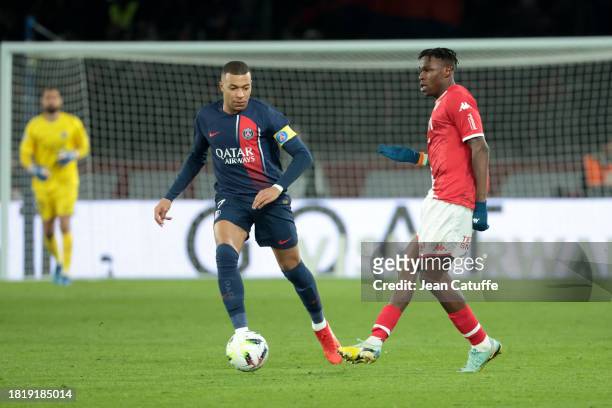 Kylian Mbappe of PSG, Wilfried Singo of Monaco during the Ligue 1 Uber Eats match between Paris Saint-Germain and AS Monaco at Parc des Princes...