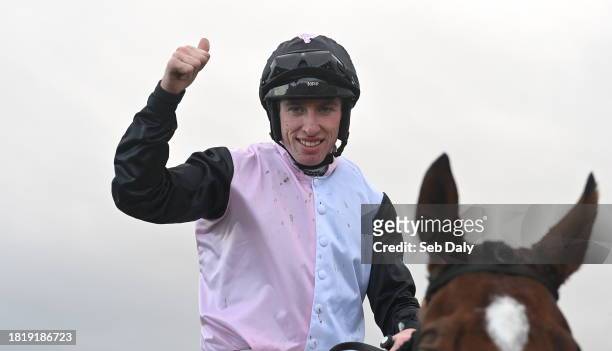 Meath , Ireland - 3 December 2023; Jockey Jack Kennedy celebrates after riding Teahupoo to victory in the Bar One Racing Hatton's Grace Hurdle during...