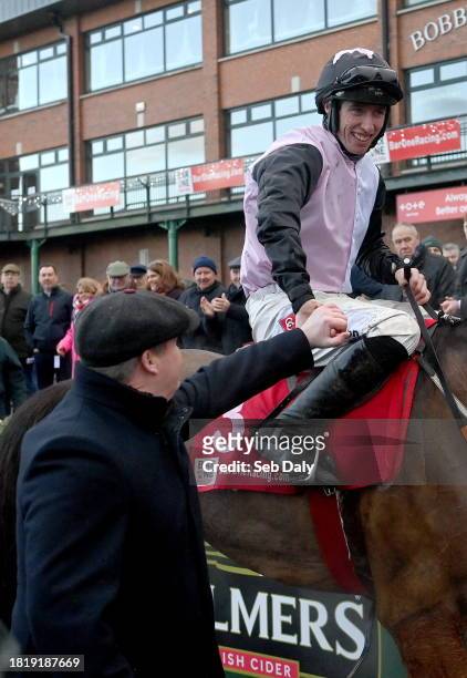 Meath , Ireland - 3 December 2023; Jockey Jack Kennedy and trainer Gordon Elliott congratulate each other after sending out Teahupoo to win the Bar...