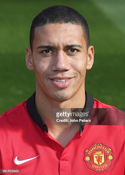 Chris Smalling of Manchester United poses at the annual club photocall at Old Trafford on September 26, 2013 in Manchester, England.
