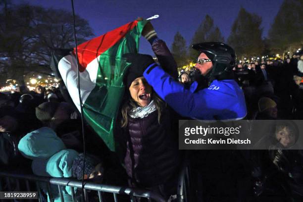 Pro-Palestine demonstrator is disrupted by U.S. Capitol Police as she protests during the U.S. Capitol Christmas Tree lighting ceremony on the West...