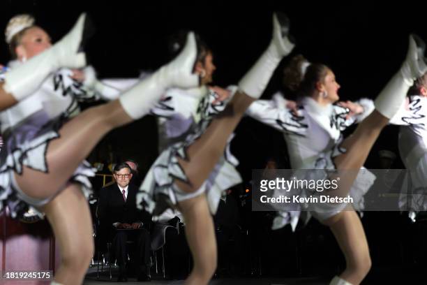 Speaker of the House Mike Johnson watches the drill team from Richwood High School in Richwood, West Virginia, perform during the lighting ceremony...