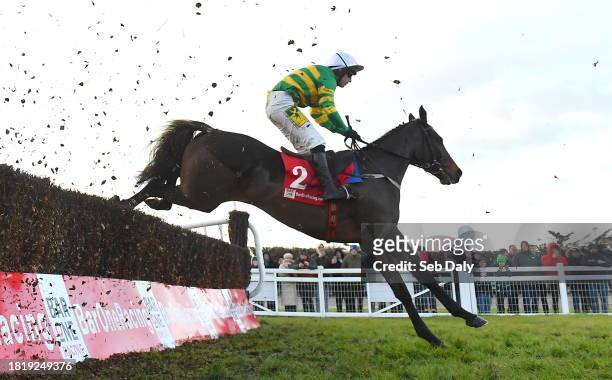 Meath , Ireland - 3 December 2023; I Am Maximus, with Jody McGarvey up, jumps the last during the first circuit on their way to winning the Bar One...
