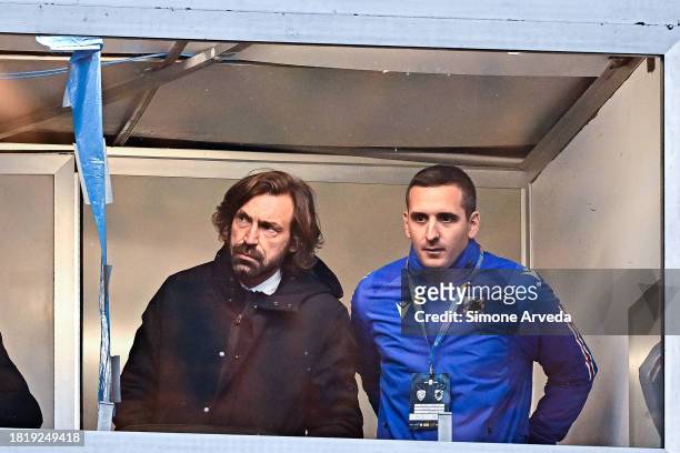 Andrea Pirlo, head coach of Sampdoria , stands next to Andrea Mancini, sports manager of Sampdoria, following a one-match ban prior to kick-off in...