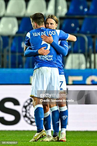 Birkir Bjarnason of Brescia celebrates with his team-mate Tom Van De Looi after scoring a goal during the Serie B match between Brescia and UC...