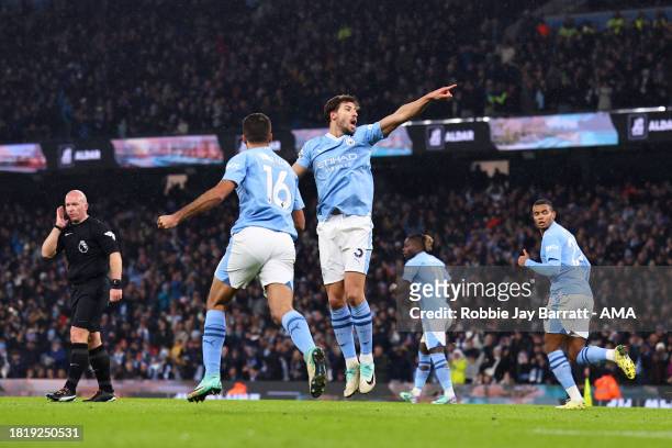 Ruben Dias of Manchester City celebrates the equaliser to masker it 1-1 during the Premier League match between Manchester City and Tottenham Hotspur...