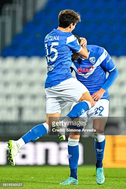Gennaro Borrelli of Brescia celebrates with his team-mate Andrea Cistana after scoring a goal during the Serie B match between Brescia and UC...