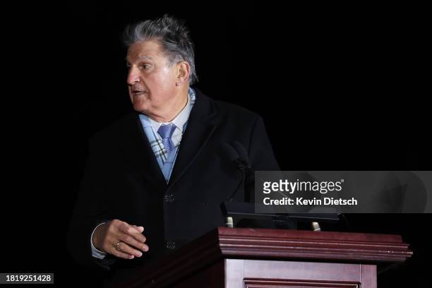 Sen. Joe Manchin delivers remarks during the lighting ceremony for the U.S. Capitol Christmas Tree on the West Front of the U.S. Capitol on November...