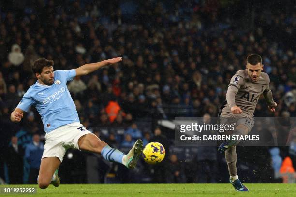 Tottenham Hotspur's Argentinian midfielder Giovani Lo Celso shoots to score their second goal during the English Premier League football match...