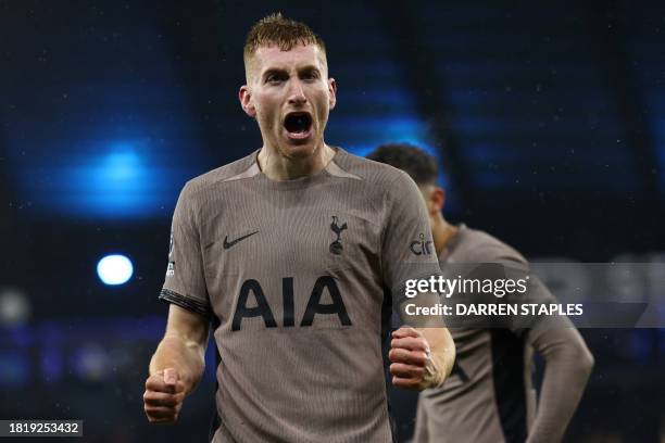 Tottenham Hotspur's Swedish midfielder Dejan Kulusevski celebrates after scoring their third goal during the English Premier League football match...