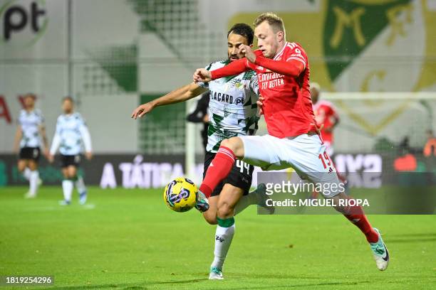 Moreirense's Brazilian defender Marcelo vies with Benfica's Danish forward Casper Tengstedt during the Portuguese league football match between...