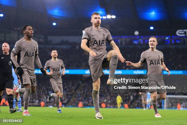 Dejan Kulusevski of Tottenham Hotspur celebrates after scoring a late equalising goal during the Premier League match between Manchester City and...