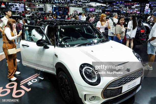 Visitors are looking at the MINI Clubman during the 40th Thailand International Motor Expo 2023 in Bangkok, Thailand, on December 3, 2023. The auto...