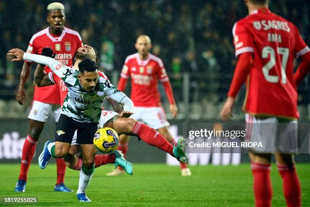 Moreirense's Brazilian midfielder Alan vies with Benfica's Argentinian defender Nicolas Otamendi during the Portuguese league football match between...