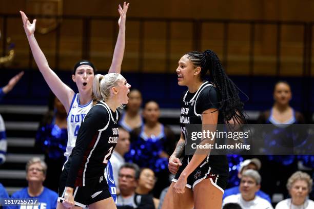 Chloe Kitts and Kamilla Cardoso of the South Carolina Gamecocks react during the second half of the game against the Duke Blue Devils at Cameron...