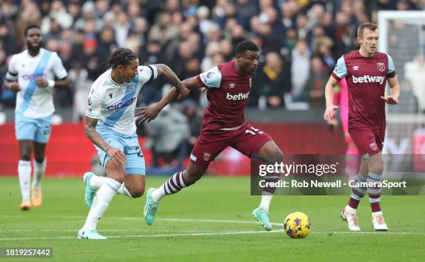 West Ham United's Mohammed Kudus and Crystal Palace's Chris Richards during the Premier League match between West Ham United and Crystal Palace at...