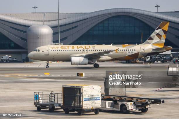 Etihad aircraft is seen at Abu Dhabi International Airport in Abu Dhabi, United Arab Emirates on December 2nd, 2023.