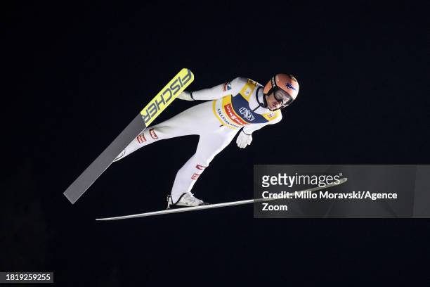 Stefan Kraft of Team Austria in action, takes 1st place during the FIS Ski Jumping World Cup Men's and Women's HS140 on December 3, 2023 in...