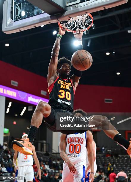 Chris Silva of the College Park Skyhawks dunks during the game against the Westchester Knicks on December 03, 2023 at Gateway Center Arena in College...