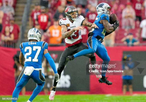 Carolina Panthers safety Xavier Woods intercepts the pass during the NFL Football match between the Tampa Bay Bucs and Carolina Panthers on December...