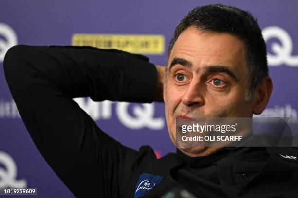 England's Ronnie O'Sullivan attends a press conference after his victory over China's Ding Junhui in the final of the 2023 MrQ UK Championship at the...