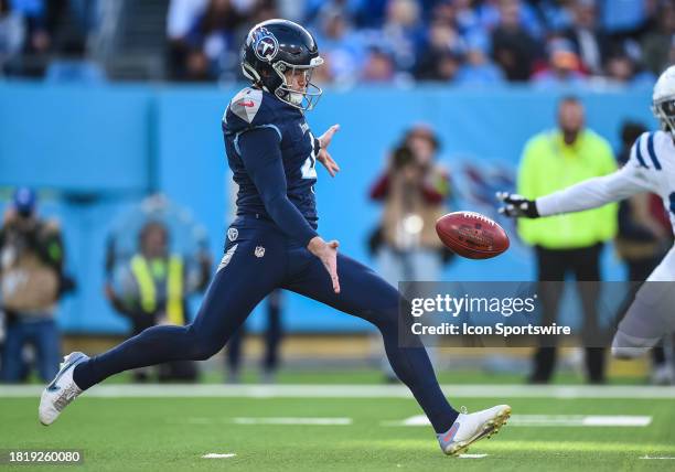 Tennessee Titans punter Ryan Stonehouse kicks a punt during the NFL game between the Tennessee Titans and the Indianapolis Colts on December 3 at...