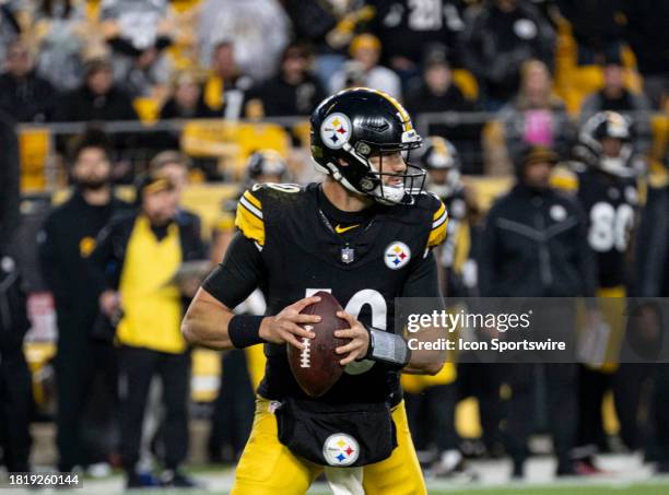 Pittsburgh Steelers quarterback Mitch Trubisky looks to connect with wide receiver Diontae Johnson before making a touchdown in the second half of...