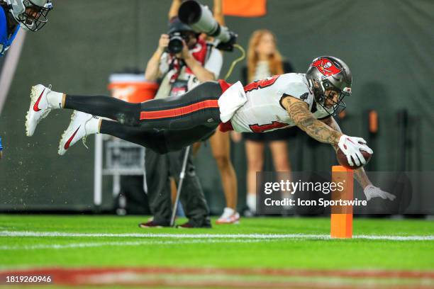 Tampa Bay Buccaneers wide receiver Mike Evans dives for the pylon for a 74 yard touchdown during the game between the Carolina Panthers and the Tampa...