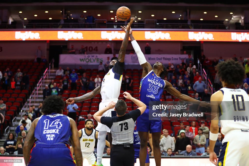 Iowa Wolves Action Leonard Miller of the Iowa Wolves goes up for the opening tip off ...