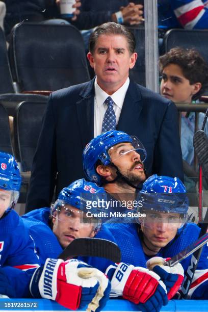 Head coach Peter Laviolette of the New York Rangers looks on from the bench against the San Jose Sharks at Madison Square Garden on December 3, 2023...