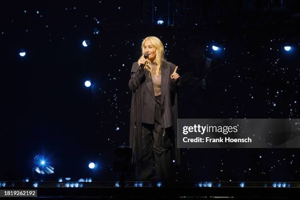 German singer Sarah Connor performs live on stage during a concert at the Mercedes-Benz Arena on December 3, 2023 in Berlin, Germany.