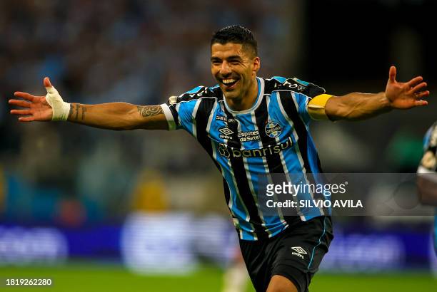 Gremio's Uruguayan forward Luis Suarez celebrates after scoring a goal during the Brazilian Championship football match between Gremio and Vasco da...